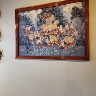a painting on the wall of a restaurant