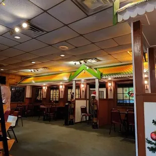 a christmas tree in the dining area