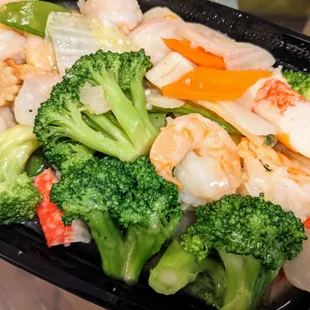 Seafood delight includes shrimp and &quot;krab&quot; meat with a medley of veggies. Such a healthy dish.