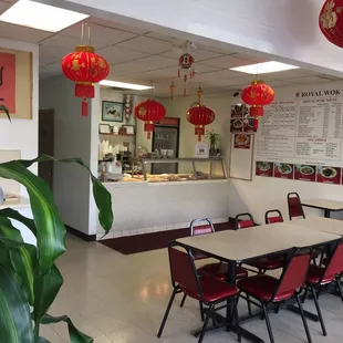 a restaurant with tables and chairs