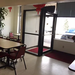 a table and chairs in a restaurant