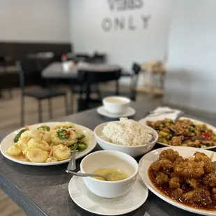 a variety of dishes of food on a table