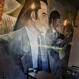 a mural of a man in a suit