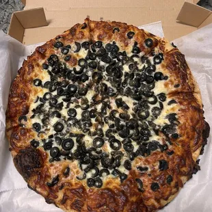 Monroe style olive pizza. It's so good. Loaded with olives. Olive this pie!