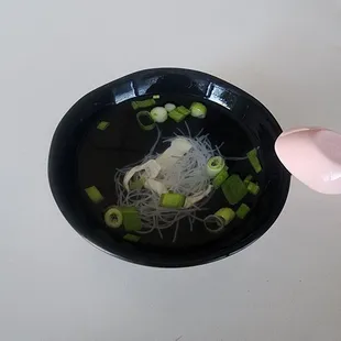 a bowl of noodles and vegetables