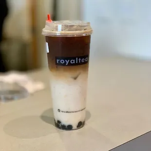 Cafe latte with boba and oatmilk