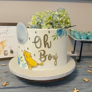 Winnie the Pooh with vanilla came, strawberry mouse with fresh strawberries and a buttercream frosting that was so delicious