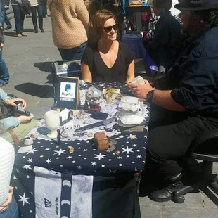 Giving a reading on the square