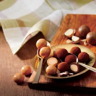  plate of nuts on a cutting board