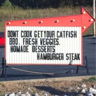 ows a sign that reads don't cook get your catfish