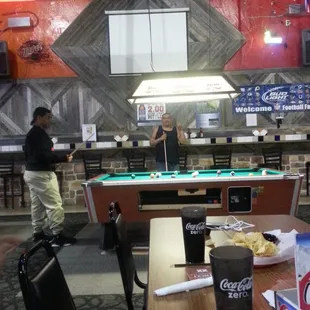 a pool table and a pool table