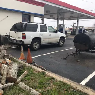 Smoker parked at a gas station