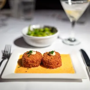 HK Crab Cakes $23 "spicy sesame beurre blanc"