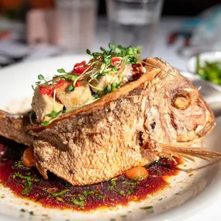 Crispy Stuffed Whole Tai Snapper $53 "fried tofu, tomato sambal"