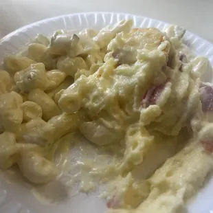 The sides. Macaroni salad and potato salad. A serve yourself vibe we love.