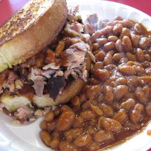 Pork sandwich and baked beans before