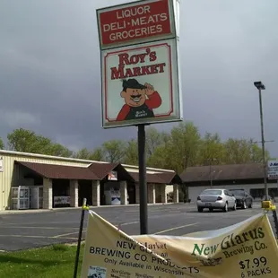 a sign for roy's market