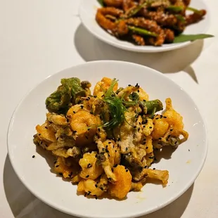 a plate of broccoli and cauliflower