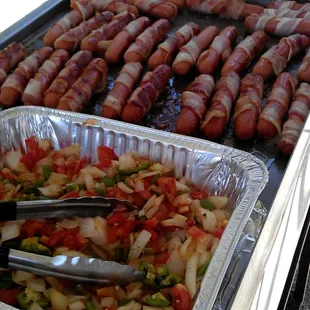 Dogs on the grill.