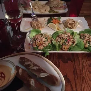 Pretzels with cheese dip (with siracha, I might ask them to hold that next time), chicken lettuce wraps, crab cakes and the Lyon sandwich