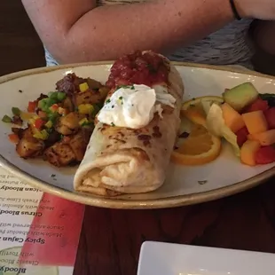 Huge breakfast burrito, home fries &amp; fruit salad