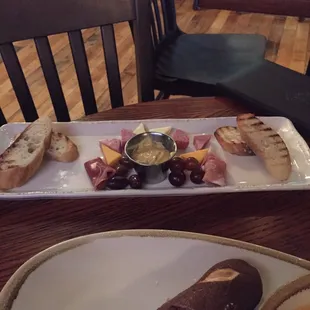 Extremely disappointing charcuterie plate and burnt pretzels