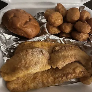 Catfish combo with bread roll and corn nuggets