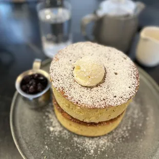 Soufflé pancakes comes with 2 thick, fluffy pieces and berry compote for syrup