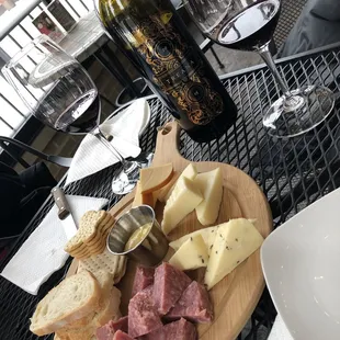 a plate of meat and cheese