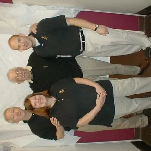 a group of people posing for a picture