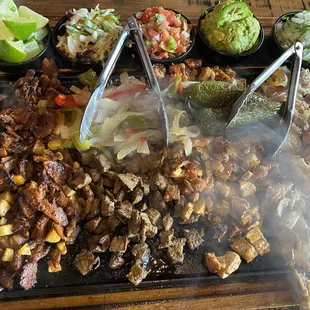 Taco Feast: Al pastor, Pollo, Carnitas and Carne Asada with all the toppings