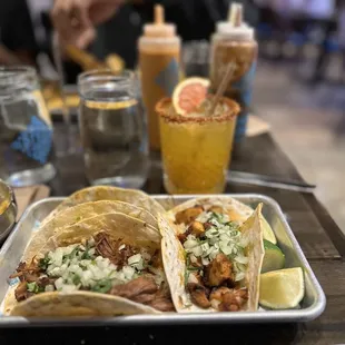 Two grilled chicken tacos and one beef  Mango passion fruit margarita