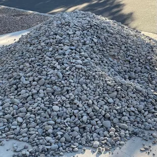 5 tons of river rock ready to xeriscape the yard!