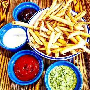 Side of fries with their sauces.  A good time!