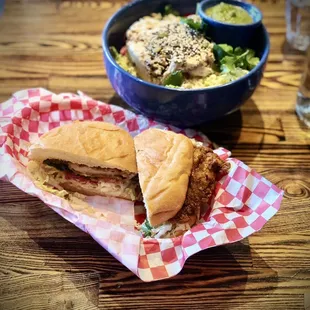 a sandwich and a bowl of salad