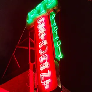 a neon sign for a restaurant