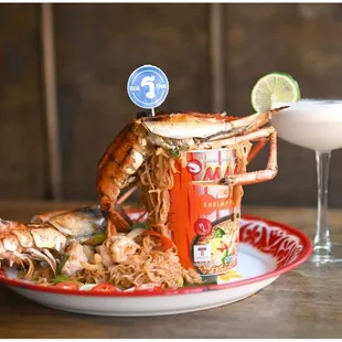 Feast your eyes on our Mama Tom Yum Grilled River Prawns paired with our refreshing Tom Ka Za cocktail