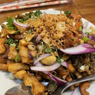 Watercress salad with calamari and shrimp