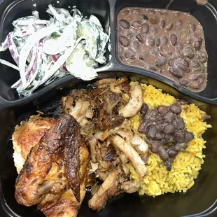 Rotisserie chicken, Porchetta with black beans, rice and the cucumber yogurt salad with onions.