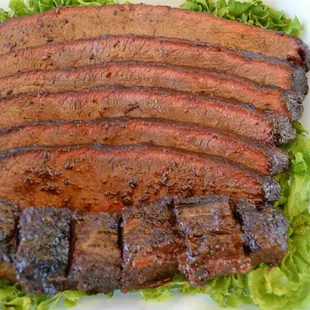 a close up of a sliced steak