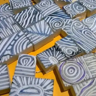 Hand c!arved rubber for a new set of stamps that work great for card making, clay and metal stamping