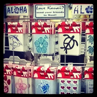 Love Kauai? Send your friends to Maui! Just a few of the hundreds of Hawaiian Island Decals that Debra and the gang make on site. Stop by!