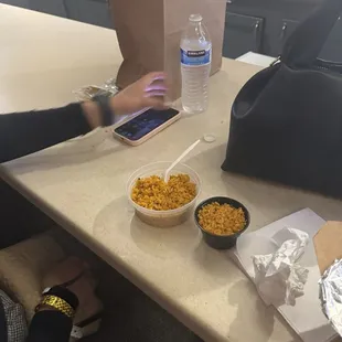 Side of rice white is actual side black is the one they will try and give you