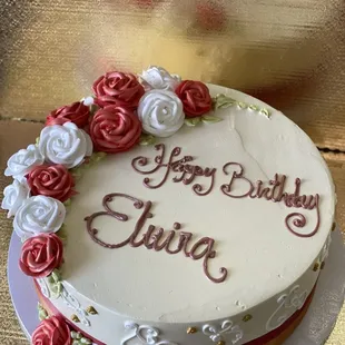 Beautiful elegant birthday cake! With whip creme roses!