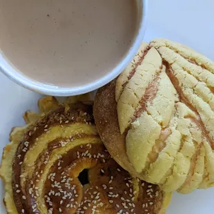 Champurrado thick hot chocolate drink and Pan Dulce