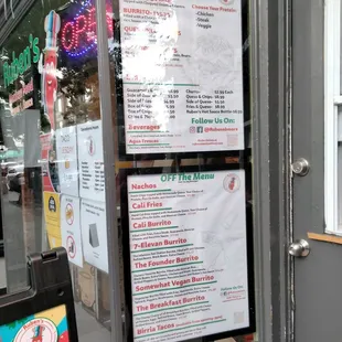 a menu in a restaurant window
