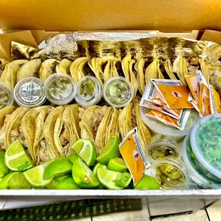 a box of tacos and limes