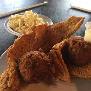 fried fish and a side of coleslaw