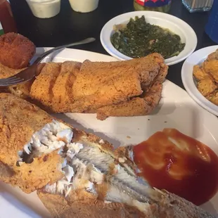 a plate of fried fish