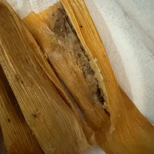Dry messy wrapped pork tamales